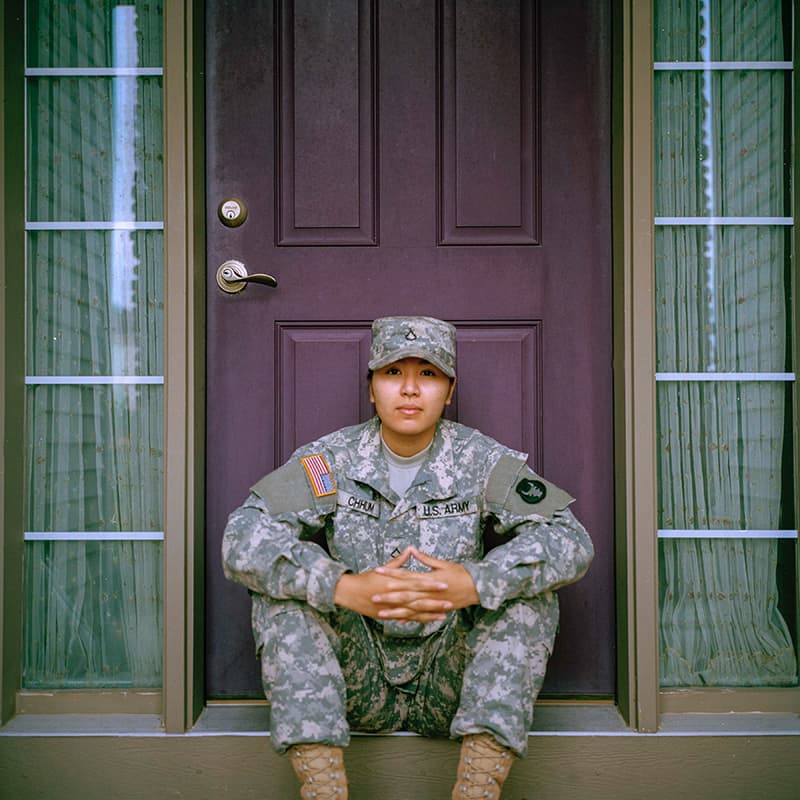 A member of the military sitting and waiting