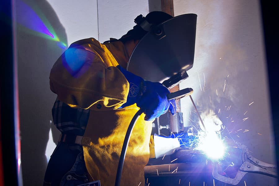 A welding student working